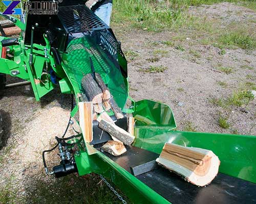 industrial firewood log splitter is working