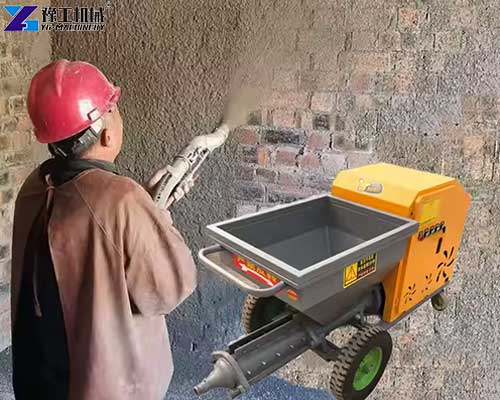 cement plaster spray machine is working