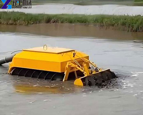 Remote-controlled dredging robot removing sludge from a lake
